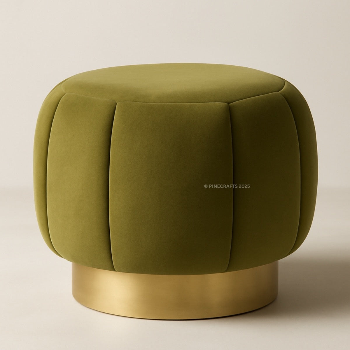 Green ottoman with a gold base on a beige background